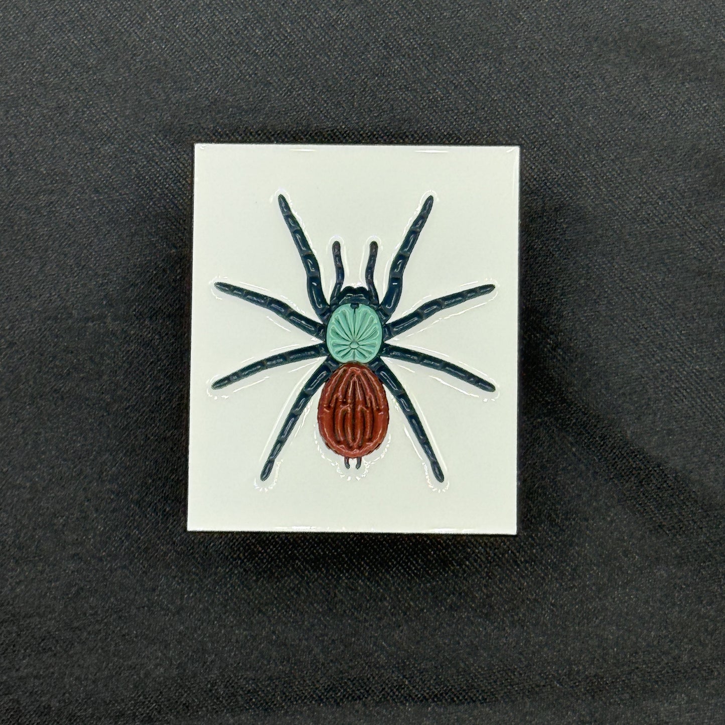 1.5 Inch Enamel Pin - Chromatopelma cyaneopubescens from The Silk Ranch / The Morph Archive