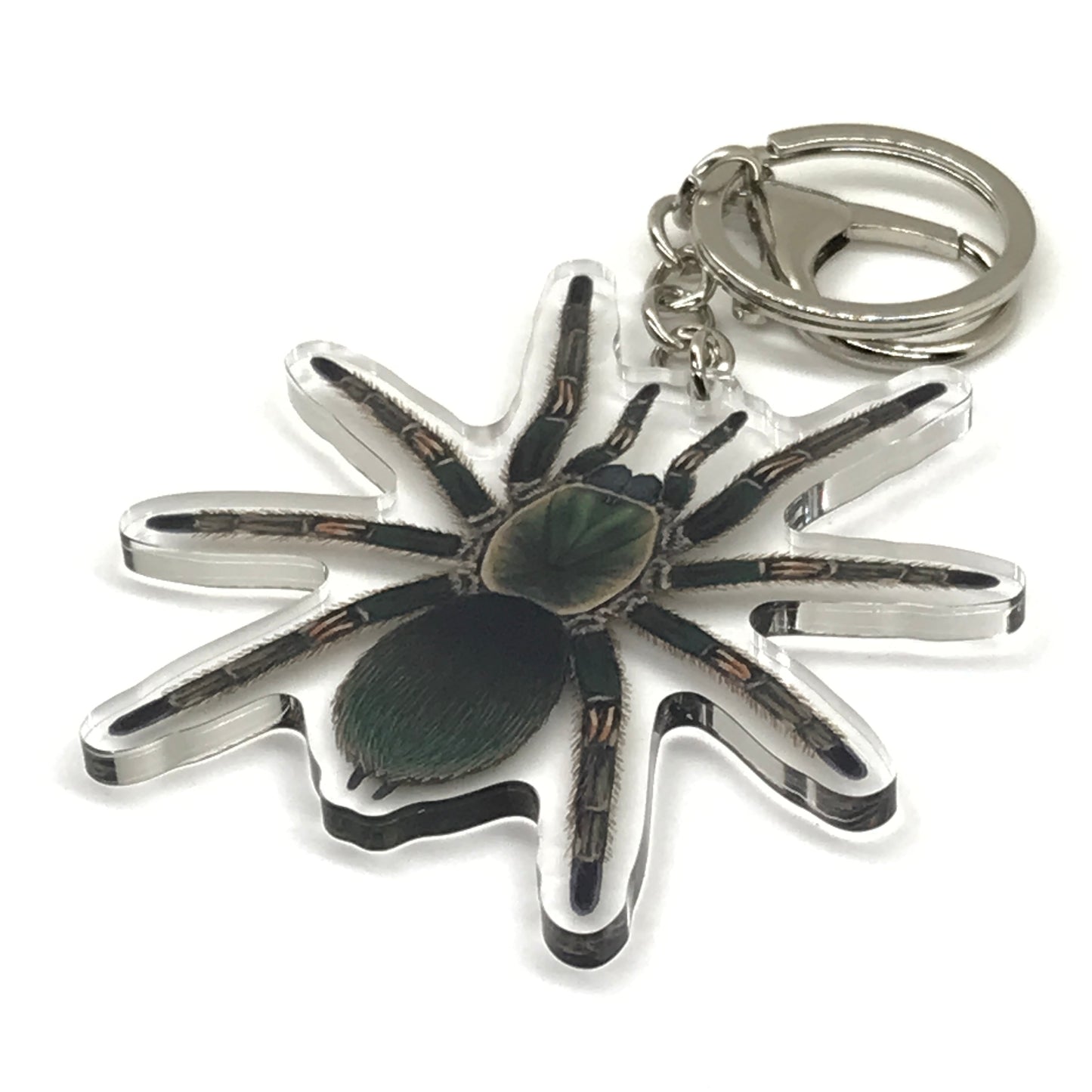 Peruvian green velvet tarantula keychain with Ewok Pruriens acrylic charm from The Silk Ranch, showcasing vibrant green velvet and detailed design.